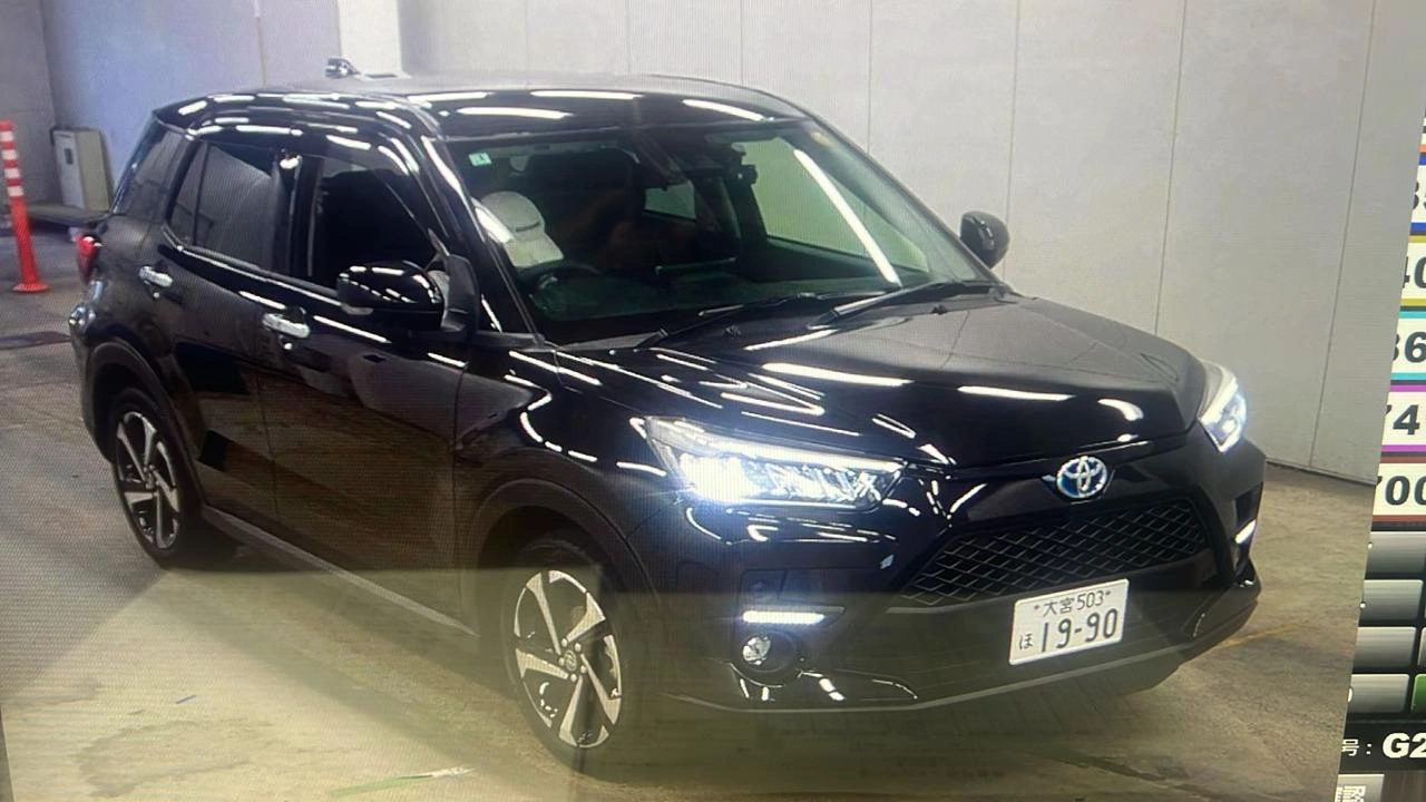 2025 Toyota Raize Hybrid interior with red accents
