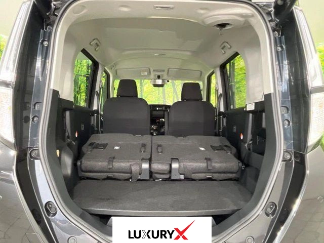 Rear view of Toyota Roomy 2024 with power sliding doors