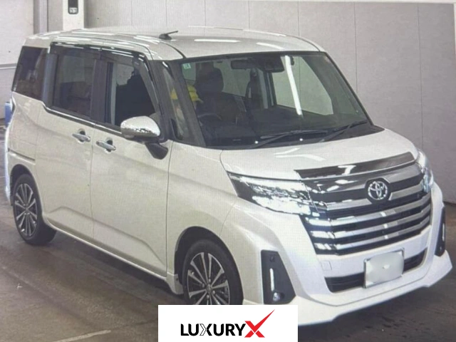 Interior cabin of 2025 Toyota Roomy GT with touchscreen navigation and paddle shifters