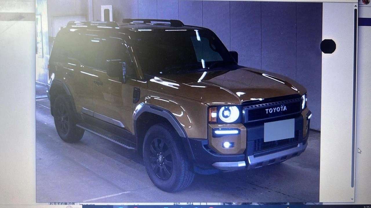 Front view of 2024 Toyota Land Cruiser LC250 First Edition with heritage LED headlamps